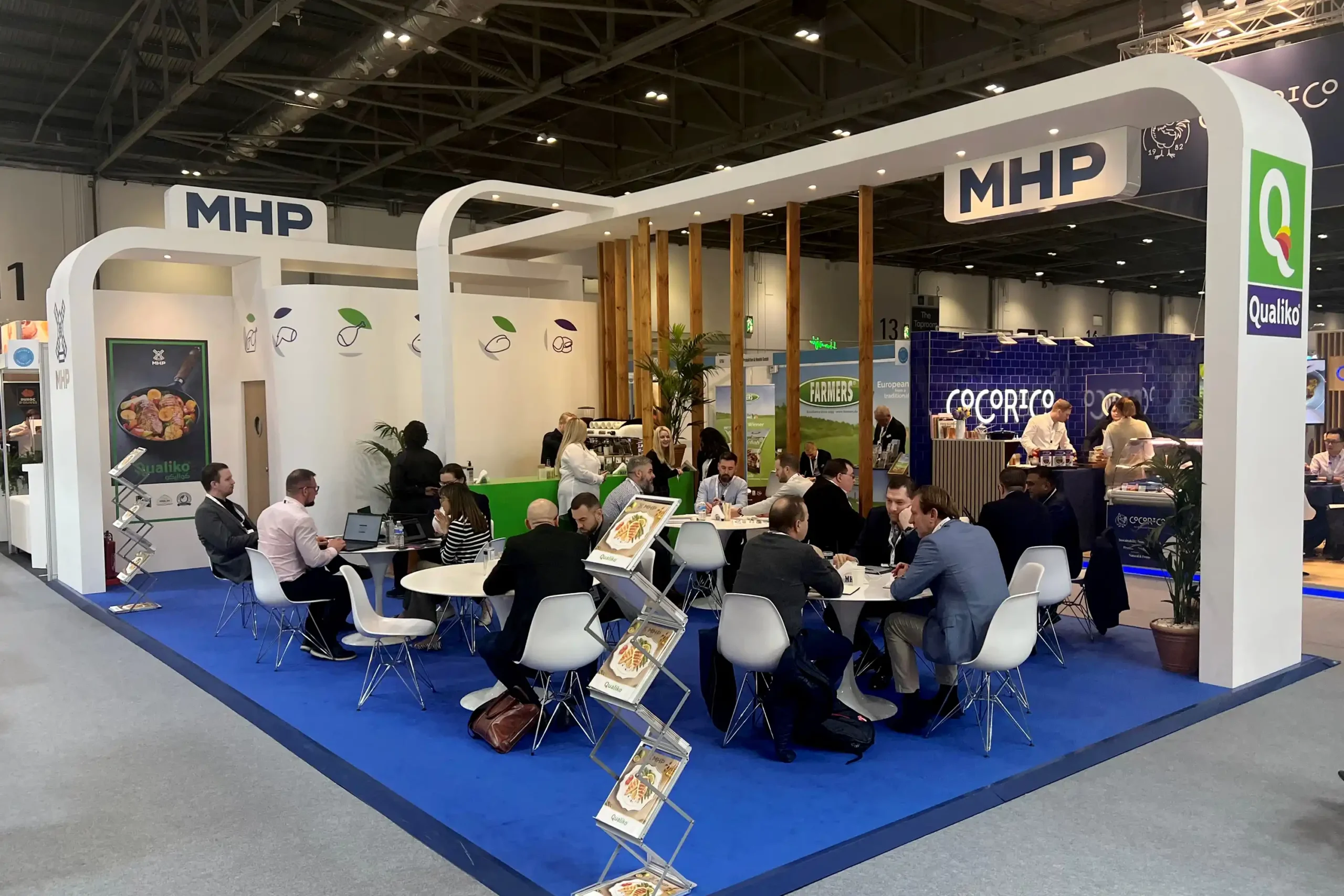 Exhibition Stands | Exhibition stand area with people working and having lunch.